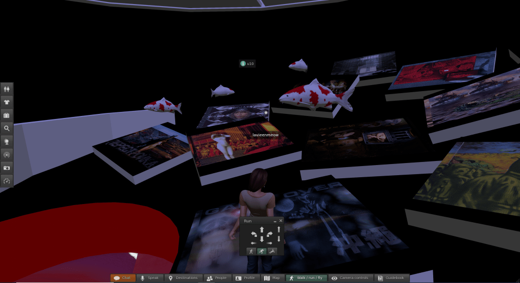 Still from Second Life: Artworks plastered on floating tiles, with red and white koi floating among them.